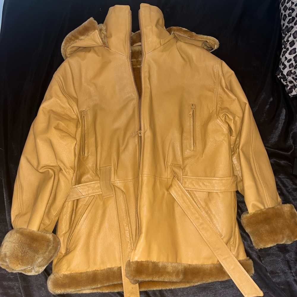 heavy fur lined leather jacket with detachable hood perfect for the winter !!